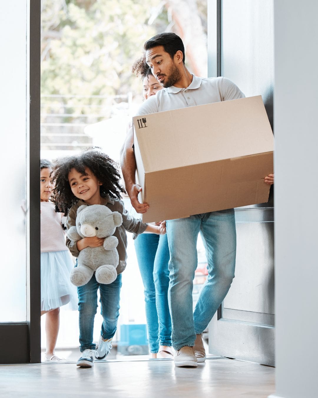 Happy family, box and moving in new home Happy family, box and moving in new home